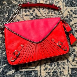 Rebecca Minkoff color block collection in pink and red- with silver accents.
